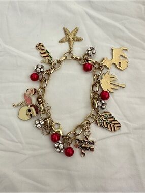 Gold-Tone North Pole Beach Charm Bracelet with Red Accents $14